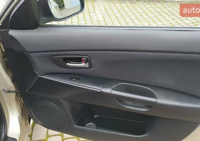 Жовтий Мазда 3, об'ємом двигуна 1.56 л та пробігом 191 тис. км за 2950 $, фото 15 на Automoto.ua