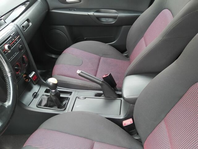 Желтый Мазда 3, объемом двигателя 1.6 л и пробегом 191 тыс. км за 2950 $, фото 9 на Automoto.ua