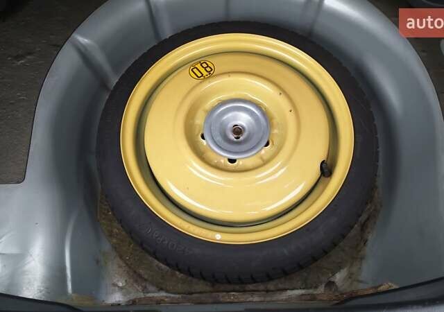 Жовтий Мазда 3, об'ємом двигуна 1.56 л та пробігом 191 тис. км за 2950 $, фото 19 на Automoto.ua