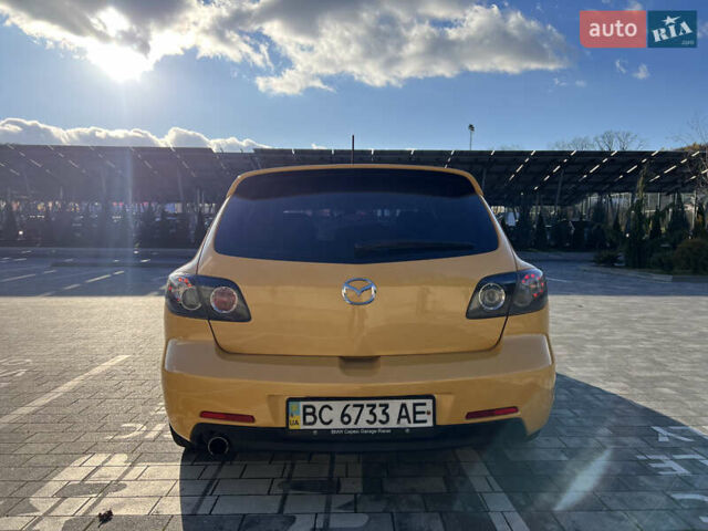 Желтый Мазда 3, объемом двигателя 2 л и пробегом 195 тыс. км за 6400 $, фото 7 на Automoto.ua