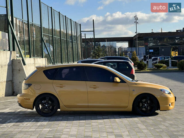 Желтый Мазда 3, объемом двигателя 2 л и пробегом 195 тыс. км за 6400 $, фото 4 на Automoto.ua