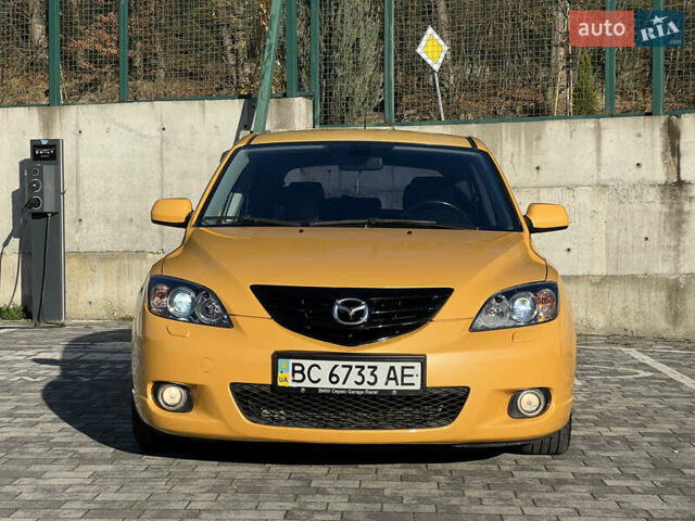 Желтый Мазда 3, объемом двигателя 2 л и пробегом 195 тыс. км за 6400 $, фото 1 на Automoto.ua