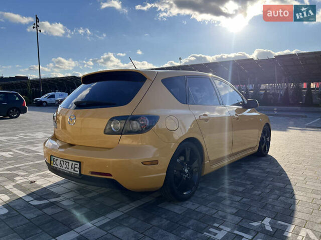 Желтый Мазда 3, объемом двигателя 2 л и пробегом 195 тыс. км за 6400 $, фото 8 на Automoto.ua