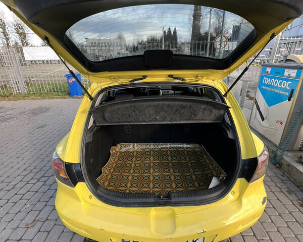 Жовтий Мазда 3, об'ємом двигуна 1.6 л та пробігом 206 тис. км за 4190 $, фото 14 на Automoto.ua