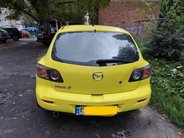 Жовтий Мазда 3, об'ємом двигуна 2 л та пробігом 254 тис. км за 4199 $, фото 3 на Automoto.ua