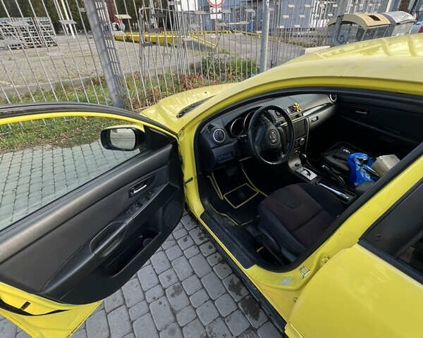 Жовтий Мазда 3, об'ємом двигуна 1.6 л та пробігом 206 тис. км за 4190 $, фото 9 на Automoto.ua