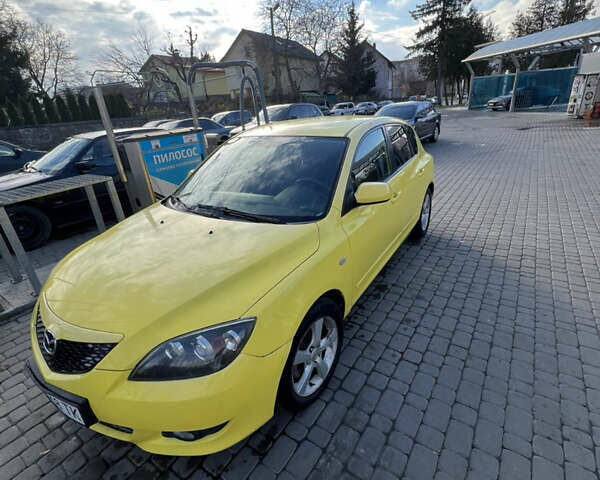 Жовтий Мазда 3, об'ємом двигуна 1.6 л та пробігом 206 тис. км за 4190 $, фото 1 на Automoto.ua