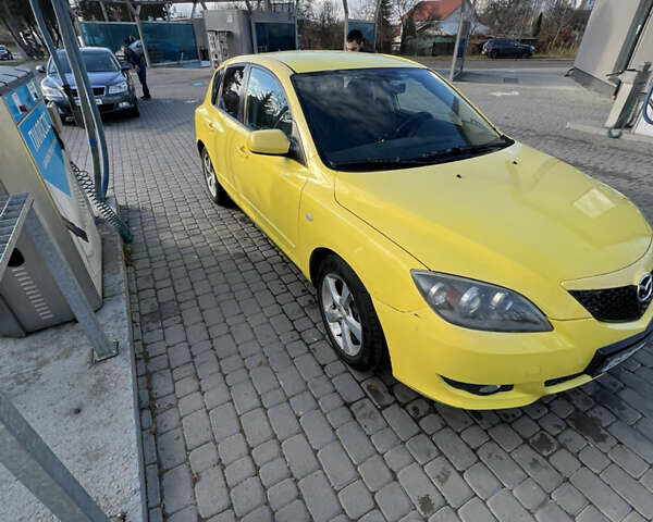 Жовтий Мазда 3, об'ємом двигуна 1.6 л та пробігом 206 тис. км за 4190 $, фото 6 на Automoto.ua