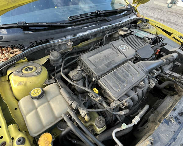 Жовтий Мазда 3, об'ємом двигуна 1.6 л та пробігом 206 тис. км за 4190 $, фото 17 на Automoto.ua