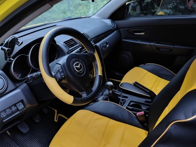 Жовтий Мазда 3, об'ємом двигуна 2 л та пробігом 254 тис. км за 4199 $, фото 6 на Automoto.ua