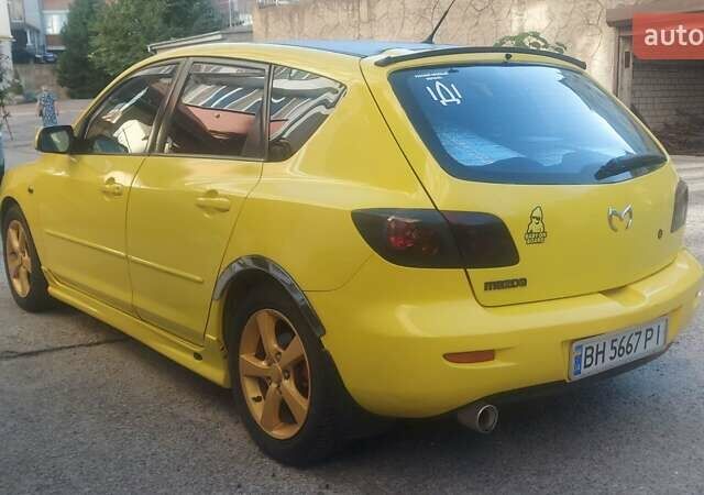Жовтий Мазда 3, об'ємом двигуна 1.6 л та пробігом 203 тис. км за 5500 $, фото 3 на Automoto.ua