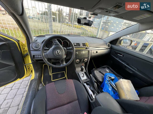 Жовтий Мазда 3, об'ємом двигуна 1.6 л та пробігом 206 тис. км за 4190 $, фото 10 на Automoto.ua