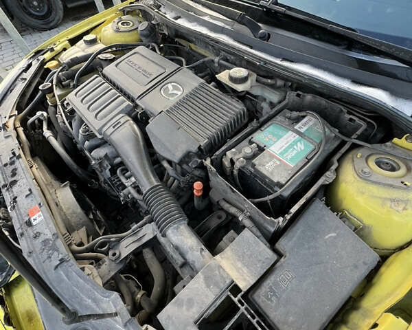 Жовтий Мазда 3, об'ємом двигуна 1.6 л та пробігом 206 тис. км за 4190 $, фото 18 на Automoto.ua