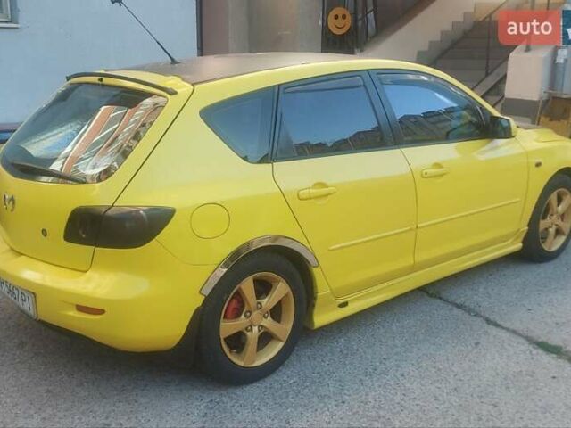 Жовтий Мазда 3, об'ємом двигуна 1.6 л та пробігом 203 тис. км за 5500 $, фото 5 на Automoto.ua