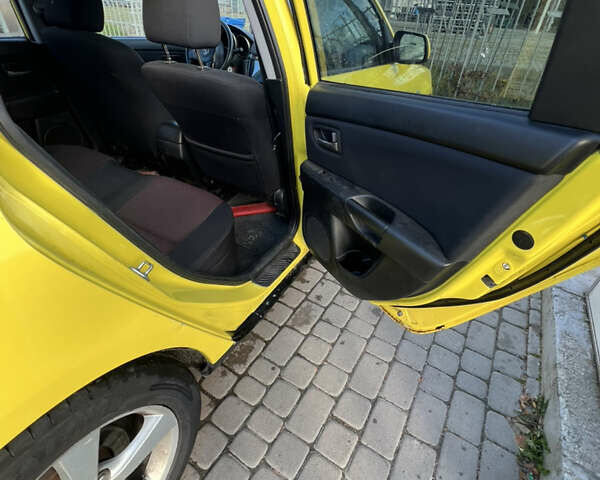 Жовтий Мазда 3, об'ємом двигуна 1.6 л та пробігом 206 тис. км за 4190 $, фото 12 на Automoto.ua