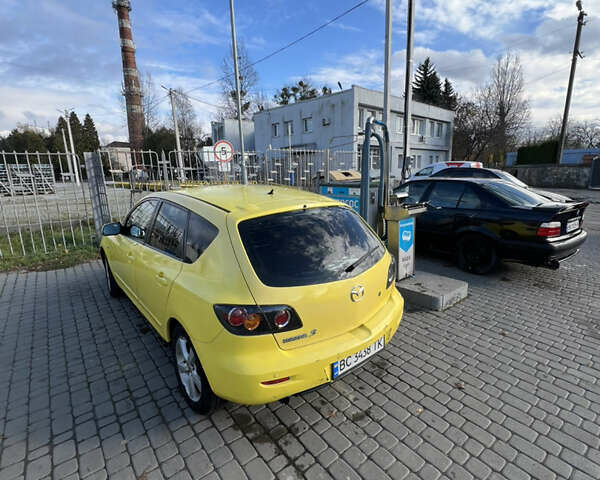 Жовтий Мазда 3, об'ємом двигуна 1.6 л та пробігом 206 тис. км за 4190 $, фото 3 на Automoto.ua