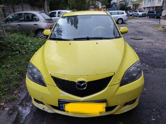 Жовтий Мазда 3, об'ємом двигуна 2 л та пробігом 254 тис. км за 4199 $, фото 1 на Automoto.ua