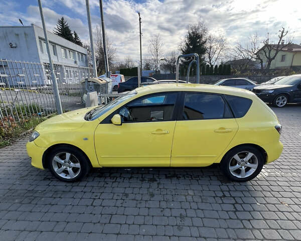 Жовтий Мазда 3, об'ємом двигуна 1.6 л та пробігом 206 тис. км за 4190 $, фото 2 на Automoto.ua