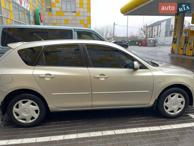 Жовтий Мазда 3, об'ємом двигуна 1.6 л та пробігом 276 тис. км за 4050 $, фото 7 на Automoto.ua