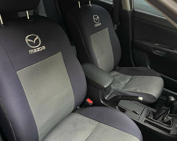 Жовтий Мазда 3, об'ємом двигуна 1.6 л та пробігом 276 тис. км за 4050 $, фото 12 на Automoto.ua