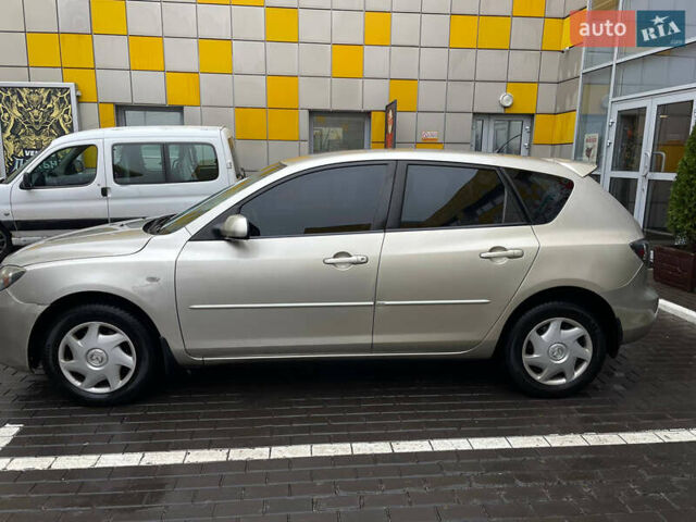 Жовтий Мазда 3, об'ємом двигуна 1.6 л та пробігом 276 тис. км за 4050 $, фото 6 на Automoto.ua