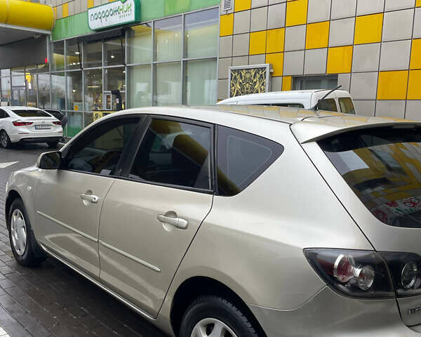 Жовтий Мазда 3, об'ємом двигуна 1.6 л та пробігом 276 тис. км за 4050 $, фото 5 на Automoto.ua