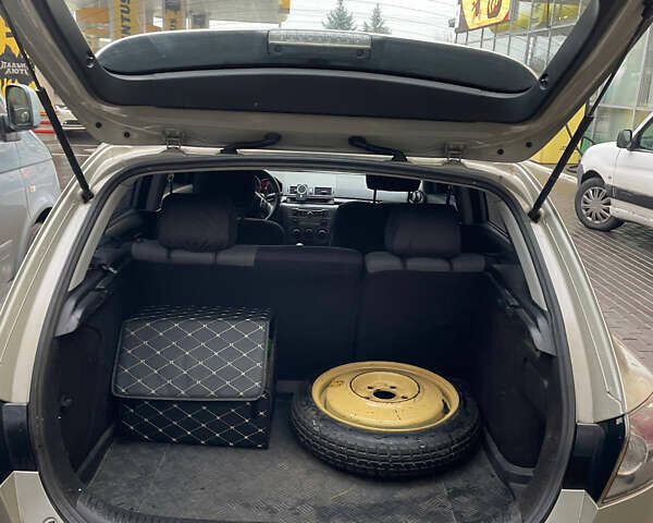 Жовтий Мазда 3, об'ємом двигуна 1.6 л та пробігом 276 тис. км за 4050 $, фото 11 на Automoto.ua