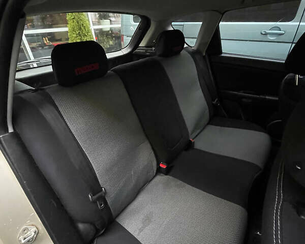 Жовтий Мазда 3, об'ємом двигуна 1.6 л та пробігом 276 тис. км за 4050 $, фото 18 на Automoto.ua