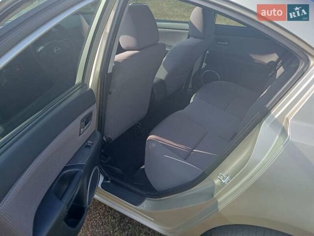 Желтый Мазда 3, объемом двигателя 1.6 л и пробегом 230 тыс. км за 4700 $, фото 1 на Automoto.ua