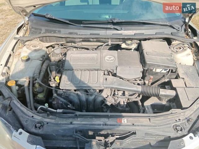 Желтый Мазда 3, объемом двигателя 1.6 л и пробегом 230 тыс. км за 4700 $, фото 9 на Automoto.ua