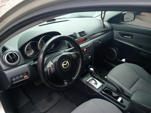 Жовтий Мазда 3, об'ємом двигуна 1.6 л та пробігом 245 тис. км за 4600 $, фото 4 на Automoto.ua