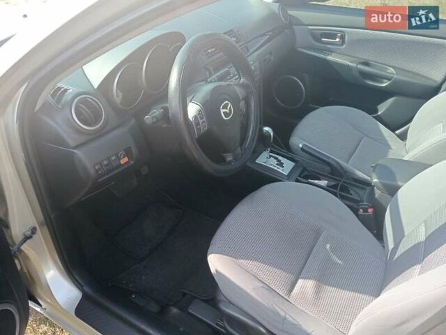 Желтый Мазда 3, объемом двигателя 1.6 л и пробегом 230 тыс. км за 4700 $, фото 3 на Automoto.ua