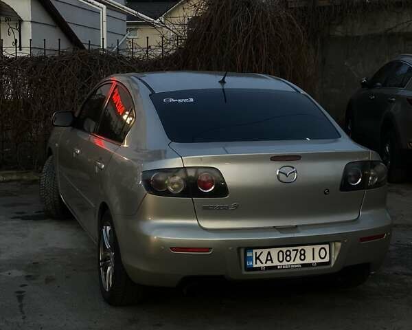 Желтый Мазда 3, объемом двигателя 1.6 л и пробегом 340 тыс. км за 6000 $, фото 24 на Automoto.ua