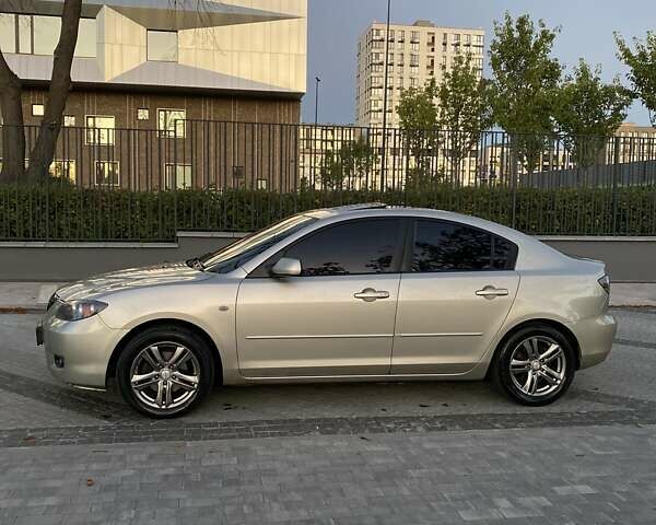 Желтый Мазда 3, объемом двигателя 1.6 л и пробегом 340 тыс. км за 6000 $, фото 3 на Automoto.ua