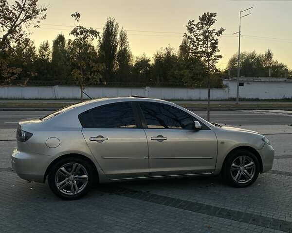 Желтый Мазда 3, объемом двигателя 1.6 л и пробегом 340 тыс. км за 6000 $, фото 7 на Automoto.ua