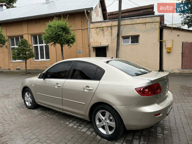 Желтый Мазда 3, объемом двигателя 1.6 л и пробегом 352 тыс. км за 4300 $, фото 11 на Automoto.ua