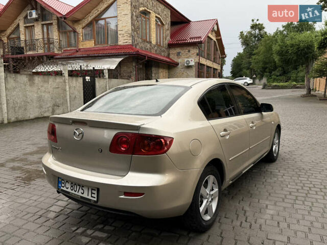 Желтый Мазда 3, объемом двигателя 1.6 л и пробегом 352 тыс. км за 4300 $, фото 6 на Automoto.ua