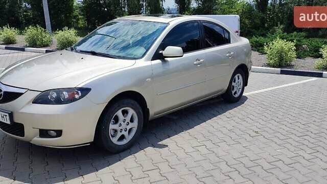 Жовтий Мазда 3, об'ємом двигуна 1.6 л та пробігом 218 тис. км за 5299 $, фото 1 на Automoto.ua