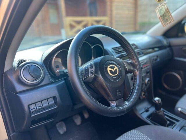 Мазда 3 2007 в Жовкве на Automoto.ua Желтый Мазда 3, объемом двигателя 1.6 л и пробегом 257 тыс. км за 3499 $, фото 9 на Automoto.ua