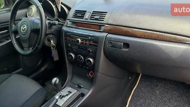 Жовтий Мазда 3, об'ємом двигуна 1.6 л та пробігом 218 тис. км за 5299 $, фото 16 на Automoto.ua