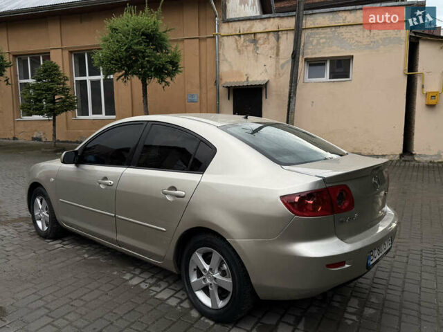 Желтый Мазда 3, объемом двигателя 1.6 л и пробегом 352 тыс. км за 4300 $, фото 8 на Automoto.ua
