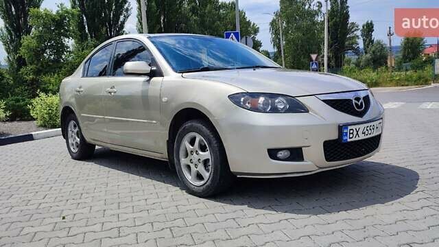 Жовтий Мазда 3, об'ємом двигуна 1.6 л та пробігом 218 тис. км за 5299 $, фото 3 на Automoto.ua