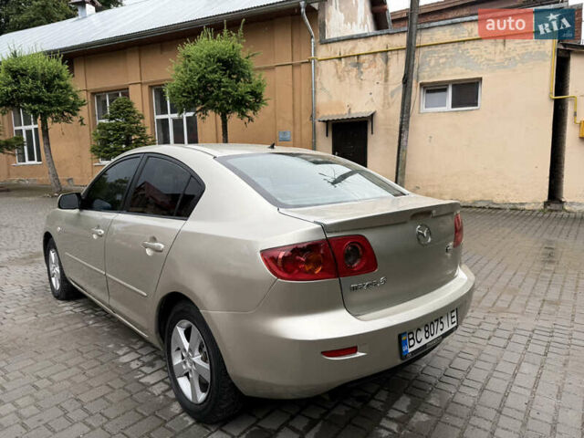 Желтый Мазда 3, объемом двигателя 1.6 л и пробегом 352 тыс. км за 4300 $, фото 12 на Automoto.ua
