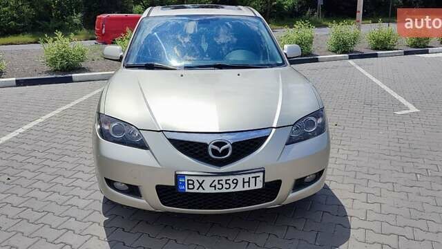 Жовтий Мазда 3, об'ємом двигуна 1.6 л та пробігом 218 тис. км за 5299 $, фото 6 на Automoto.ua