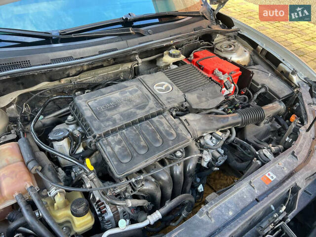 Мазда 3 2007 в Жовкве на Automoto.ua Желтый Мазда 3, объемом двигателя 1.6 л и пробегом 352 тыс. км за 3450 $, фото 35 на Automoto.ua