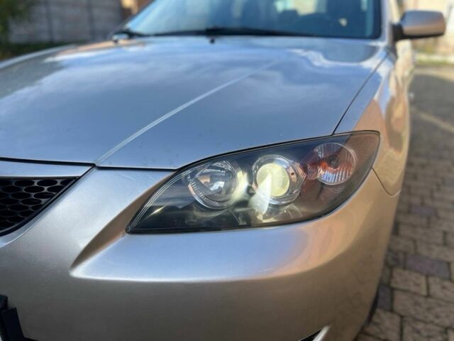 Мазда 3 2007 в Жовкве на Automoto.ua Желтый Мазда 3, объемом двигателя 1.6 л и пробегом 257 тыс. км за 3499 $, фото 13 на Automoto.ua