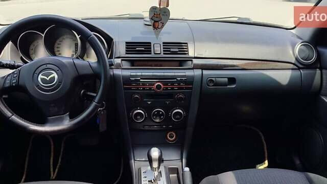 Жовтий Мазда 3, об'ємом двигуна 1.6 л та пробігом 218 тис. км за 5299 $, фото 24 на Automoto.ua
