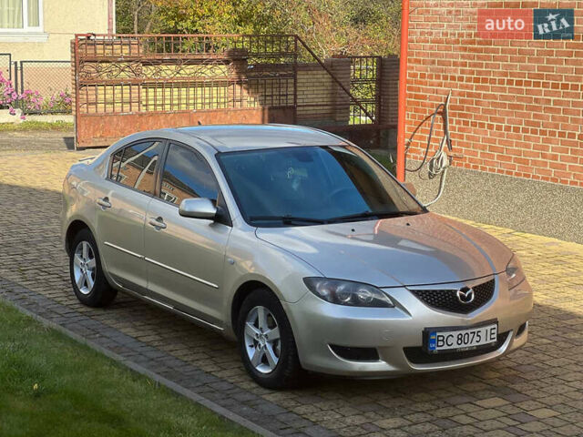 Мазда 3 2007 в Жовкве на Automoto.ua Желтый Мазда 3, объемом двигателя 1.6 л и пробегом 352 тыс. км за 3450 $, фото 8 на Automoto.ua