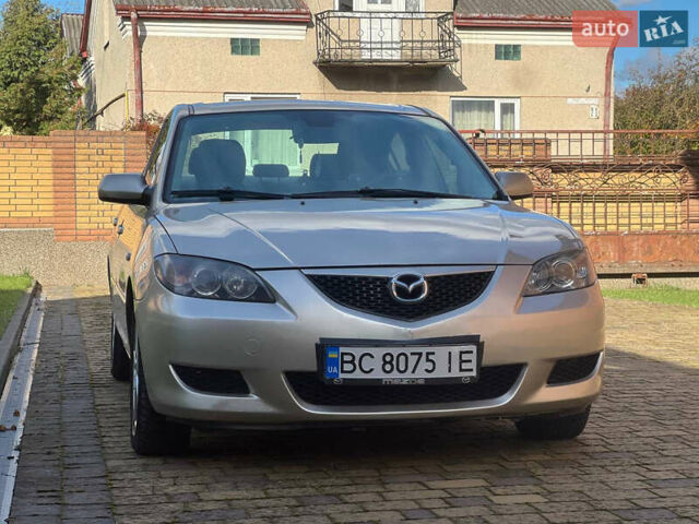 Мазда 3 2007 в Жовкве на Automoto.ua Желтый Мазда 3, объемом двигателя 1.6 л и пробегом 352 тыс. км за 3450 $, фото 11 на Automoto.ua