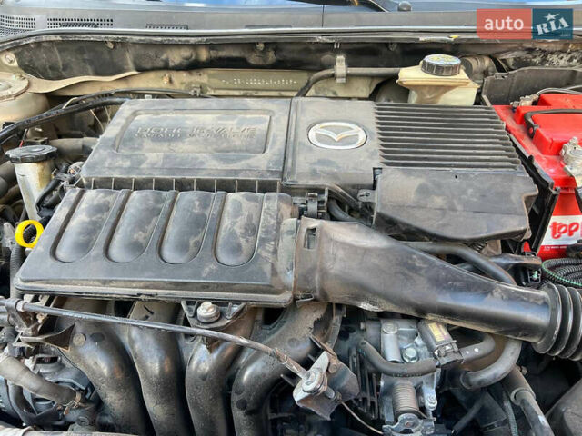 Мазда 3 2007 в Жовкве на Automoto.ua Желтый Мазда 3, объемом двигателя 1.6 л и пробегом 352 тыс. км за 3450 $, фото 36 на Automoto.ua